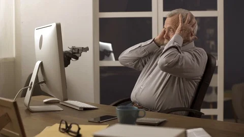 Thief hacker attack on a senior's computer Stock Footage 112643864