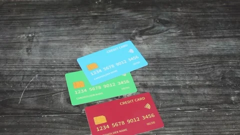 Thief hand take all credit cards isolated black board Stock Footage 309950137