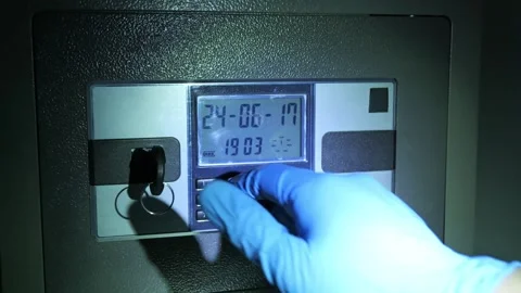 The thief is opening a safe with numerical keypad in the night 스톡 동영상 277592838