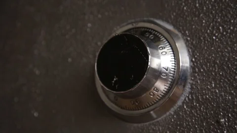 Thief opens safe with combination lock Stock Footage 86895898