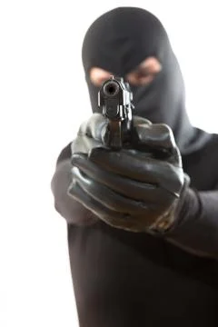 Thief pointing a gun Stockfoto's