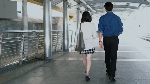 Thief snatched  female bag while walking with a boyfriend Stock Footage 85653517