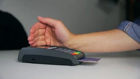 Thief is stealing pin code and identity on payment (pos) terminal machine. Stock Footage 114973830