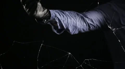 Thief Taking Glass Out Stock Footage 10881241