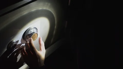 The thief is trying to open the safe Video stock 98555146