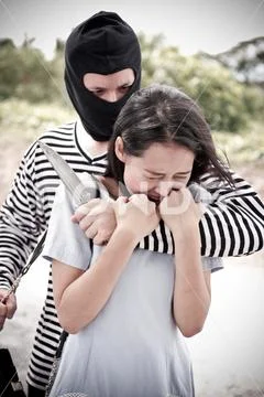 Thief is trying to steal at the public place Stock Photos