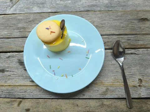 Thin almond sponge cake in the base, mousse of exotic fruits. High-quality .. Stock Photos