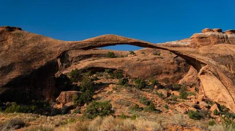 Thin arch formation in the desert Stock Photos