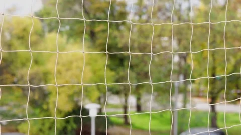 Thin balcony net swaying softly in breeze, safety barrier blends with open .. Stock Footage 320736384