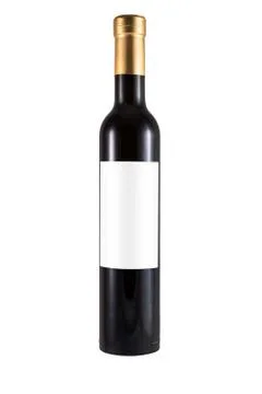 Thin bottle of red wine made of green glass and blank label Stock Photos