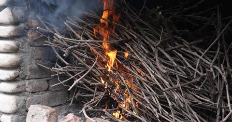 Thin Branches Ignite In The Fireplace Before Cooking Stock Footage 116996335