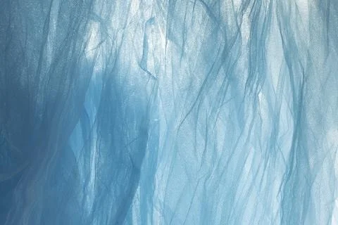 Thin bright blue fabric, soft focus close up, abstract texture Foto stock