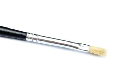 Thin brush isolated on white Stock Photos