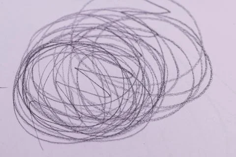 Thin chaotic lines drawn on cheap thin paper with a pencil with a black lea.. Foto stock