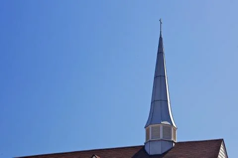 Thin church spire Stock Photos