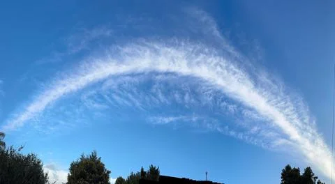 Thin cirrus clouds in the blue sky Stock Photos