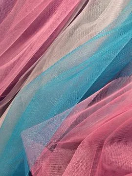 Thin cloth. Thin translucent colored fabric. Fabric background Stock Photos