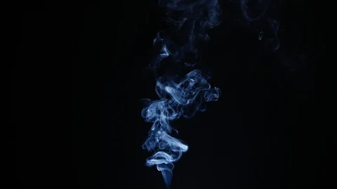 Thin cloud of cigarette smoke against a black background. Stock Footage
