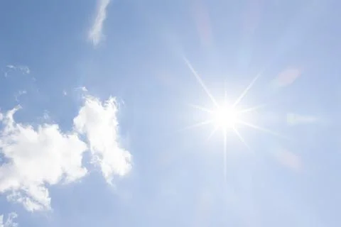 Thin Cloud Wisps Surrounding Bright Sunlight Stock Photos