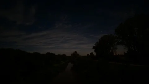 Thin clouds on night sky 2 - time lapse Stock Footage 124094460