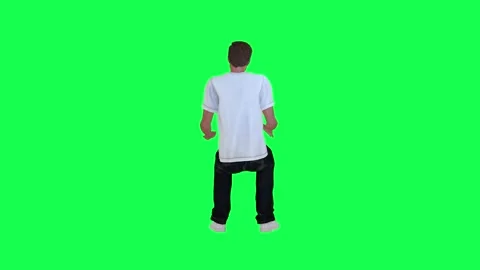 A thin criminal man in a green screen with a white t-shirt and black pants, torn Stock-Footage 248000151