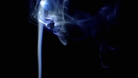 Thin Curls of Blue Smoke Rise Up, Filling Empty Space Stock Footage 263822939