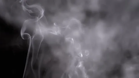 Thin Curls of Grey Smoke Rise Up, Filling Empty Space Stock Footage 263821810
