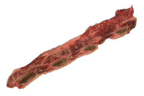 Thin cut strip of raw Beef's rib 2 on white background - bones side up Stock-Fotos