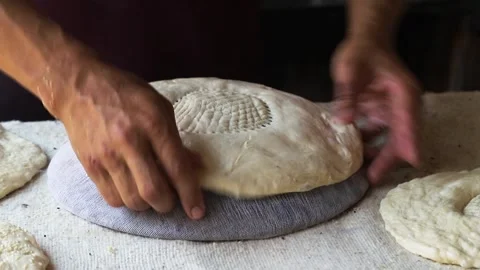 Thin dough for Uzbek flatbread Stock Footage 245336376