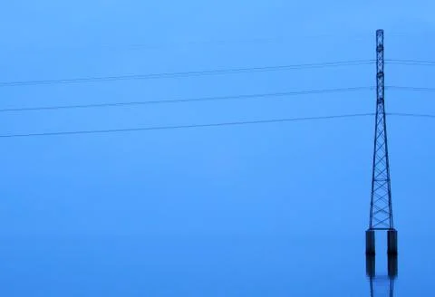 Thin electric tower Stock Photos