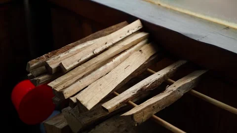 Thin firewood for kindling a fire, close-up. Smooth camera movement Stock Footage 324696601