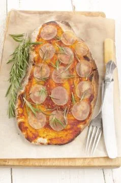 Thin flat bread pizza with potato Stock Photos