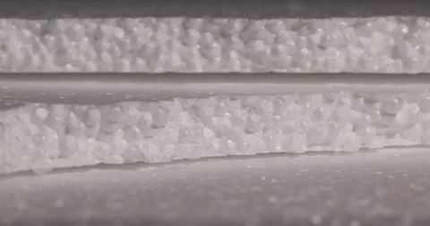 Thin foam for storing and transporting goods or building insulation, white foam Stock Footage 312162417