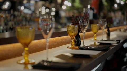 Thin glass goblet. Elegant look. Light reflection in a glass goblet. Stock Footage 329916196
