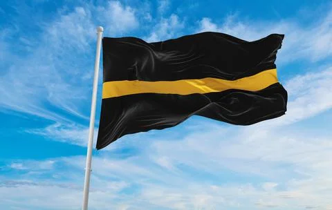 Thin Gold Line flag waving at cloudy sky background on sunset, panoramic view Stock Illustration
