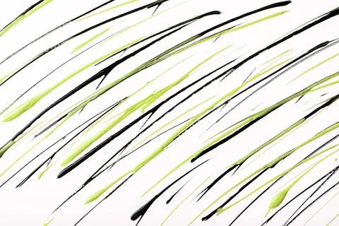 Thin green and black lines and splashes drawn on white background. Stockillustratie