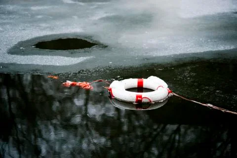 Thin ice and a life preserver Stock Photos