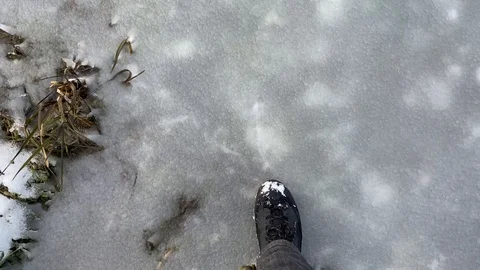Thin ice crack under my foot Stock Footage 122446939