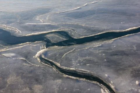 Thin ice is cracking. Stock Photos