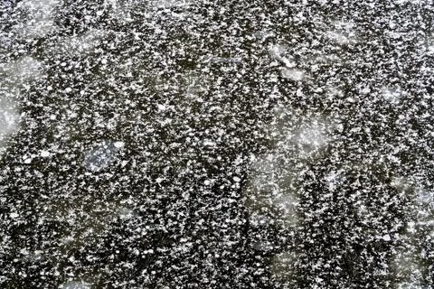 Thin ice with snowflakes Stock Photos