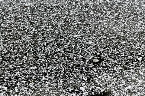 Thin ice with snowflakes Stock Photos