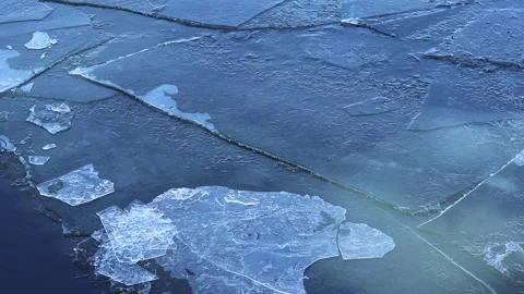 Thin ice on a winter river close-up Stock Footage 346764084