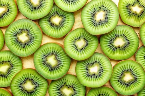 Thin kiwi rings. Background of thin kiwi rings Stock Photos