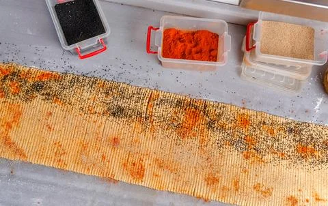 Thin lavash with red spice Stock Photos