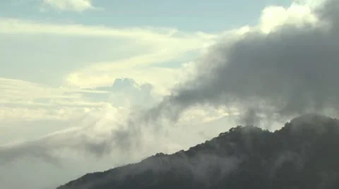 Thin Layer of Clouds Passing over Mountain Top 스톡 동영상 19196443
