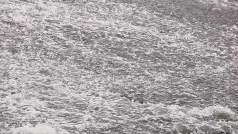 Thin layer of water flows over sloping surface Stock Footage 141730970