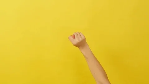 A thin man shows his hand and shakes his thumb Stock Footage 123054904