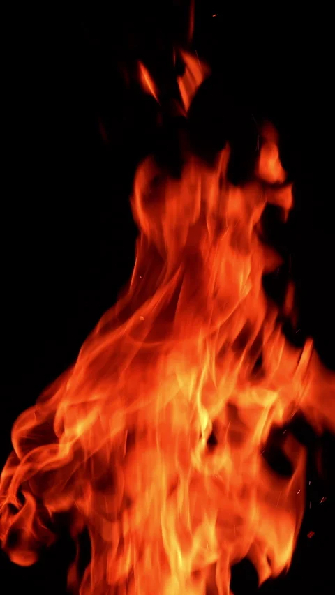 Thin narrow flame burning. Fire going up at the black backdrop.  Stock Footage 308305811