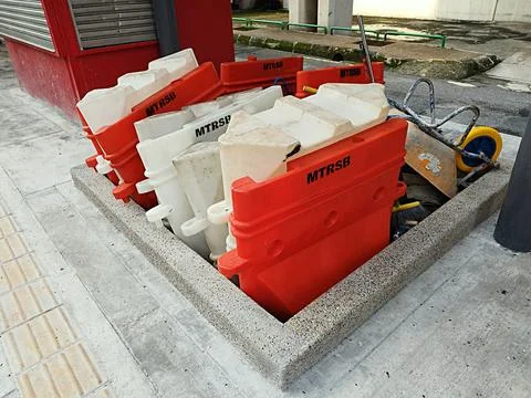 Thin plastic barriers filled with water Stock Photos