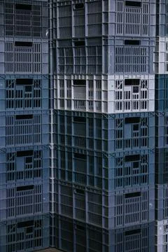 Thin plastic trays used for both packaging shelf food and for take-out food Stock Photos